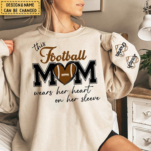 This Football Mom Wears Her Heart On Her Sleeve - Personalized Sweatshirt